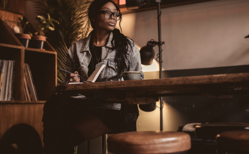 A portrait of Bess Obarotimi looking thoughtful and composed, capturing the power of self-awareness in a moment of quiet reflection.