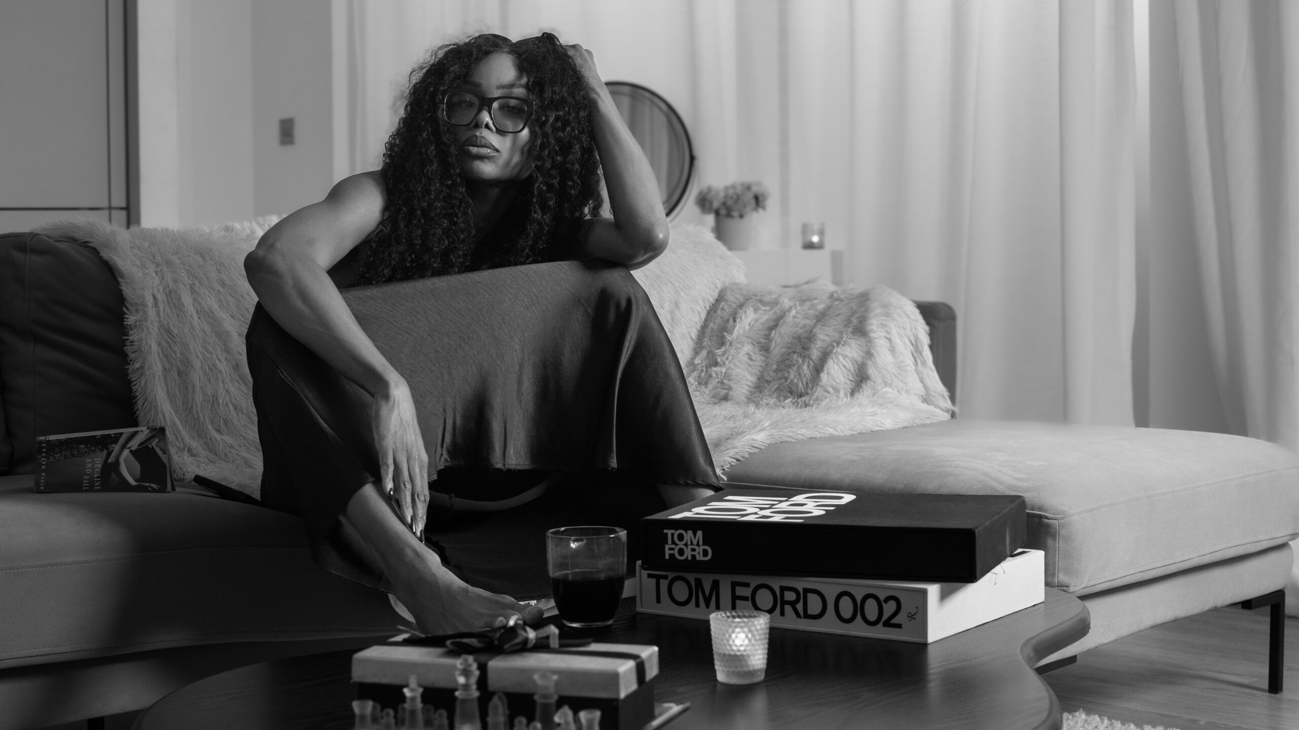 Bess Obarotimi seated on a sofa, speaking about why she wrote I AM Success for her audience.